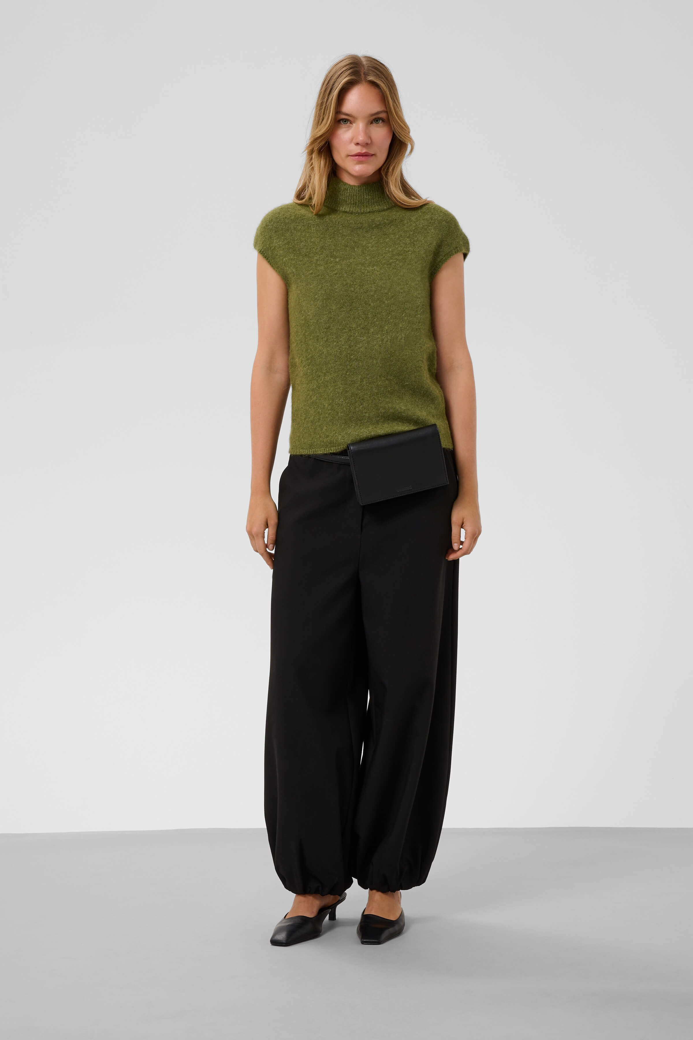 Model wearing the Soaked in Luxury Anina mock-neck pullover