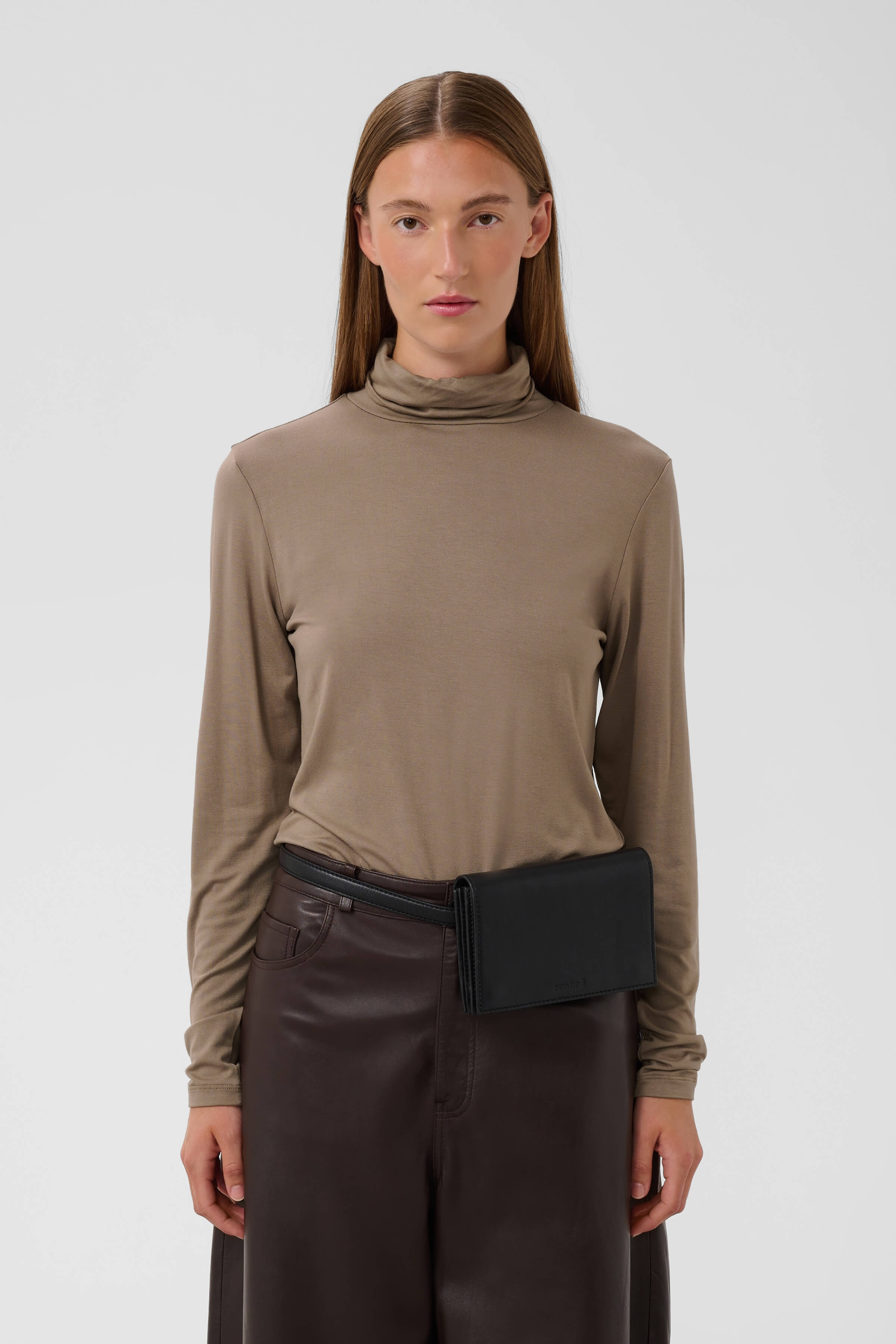 Women’s  ribbed roll-neck top by Soaked in Luxury