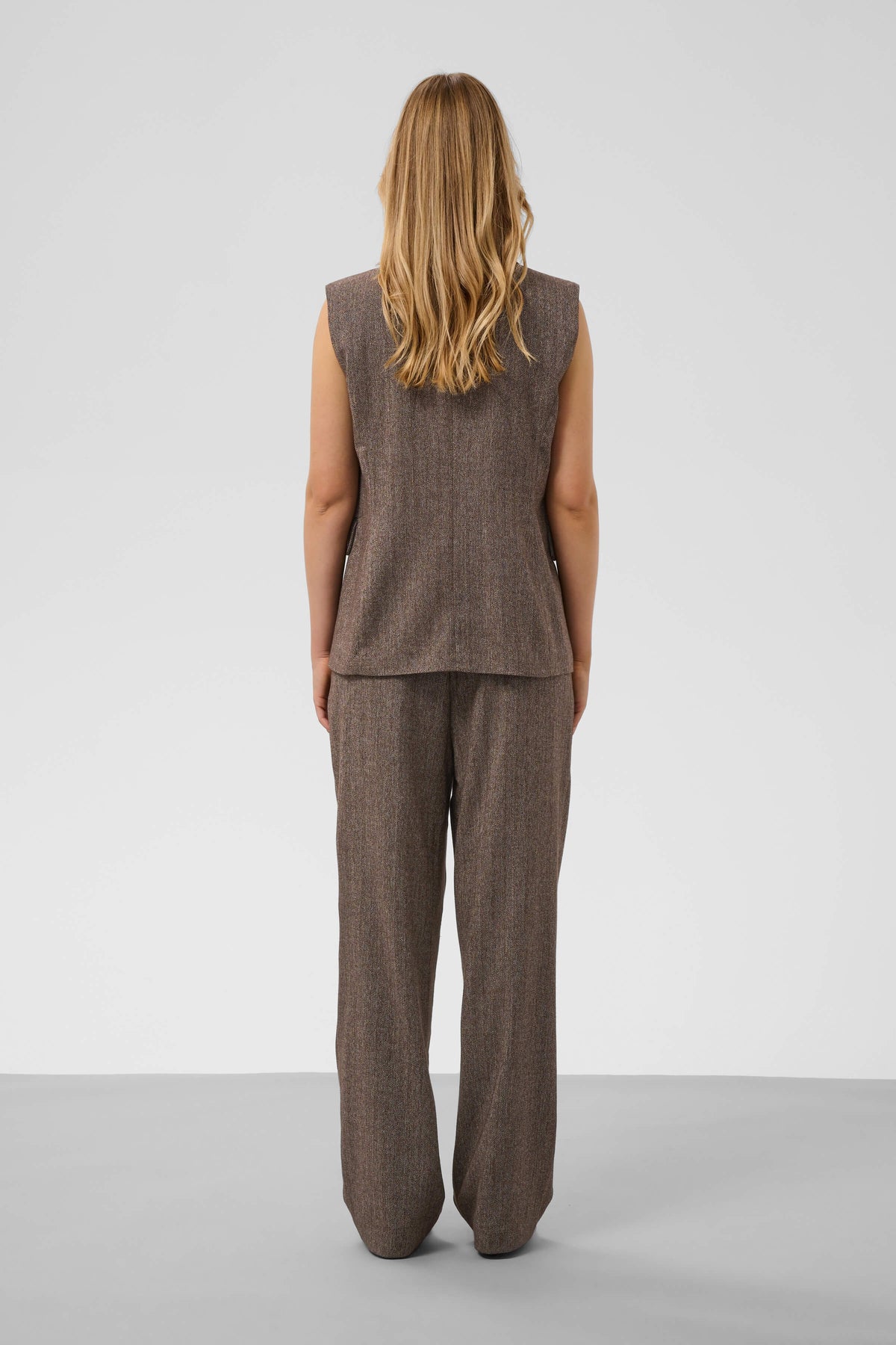 Rear view of the Kango Trousers and matching waistcoat