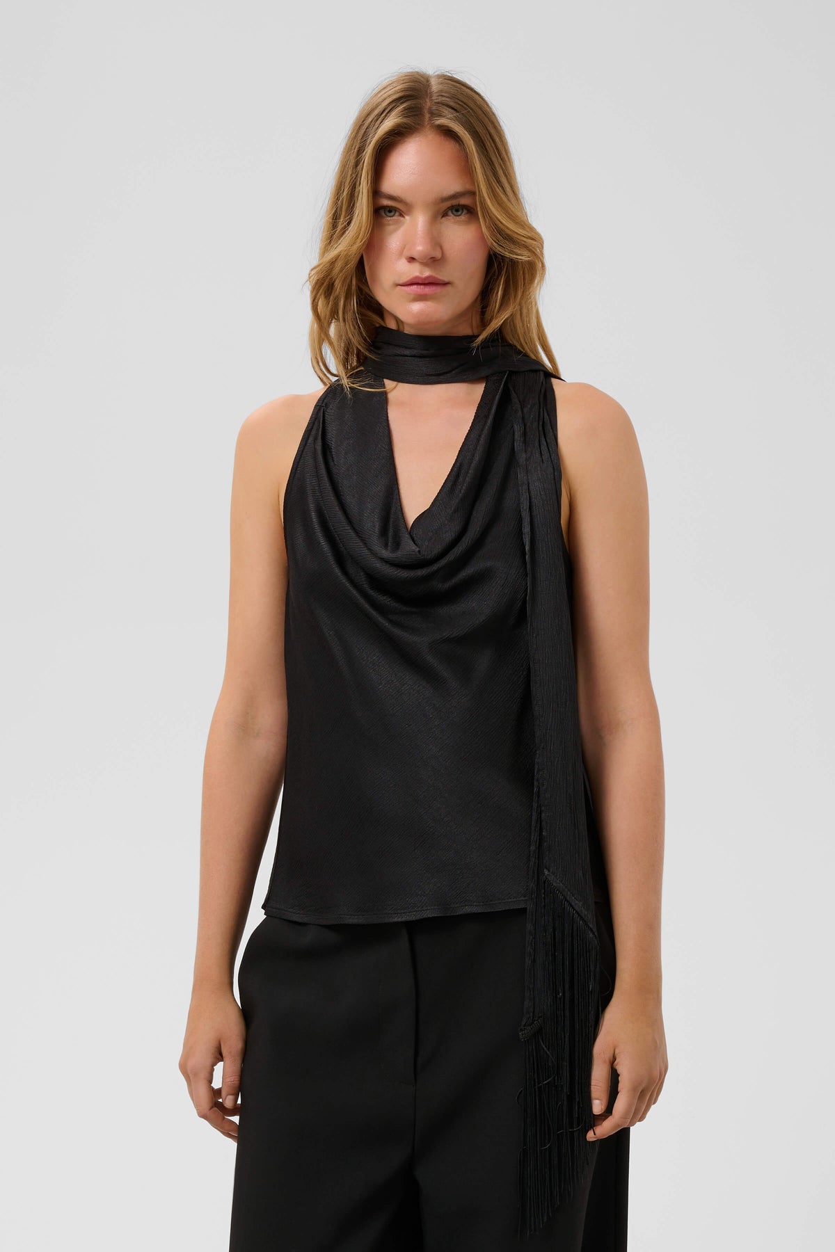 odel wearing the Soaked in Luxury Mirabella Aragat draped scarf top