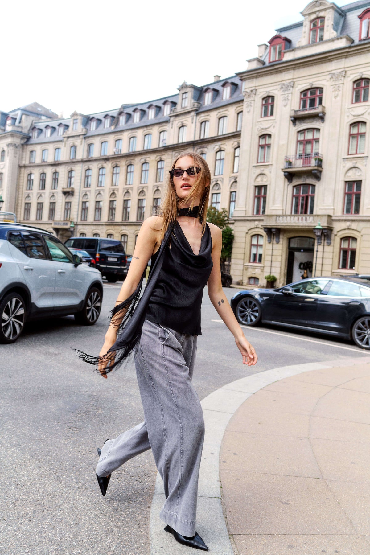 Mirabella Aragat draped sleeveless top styled with wide-leg trousers