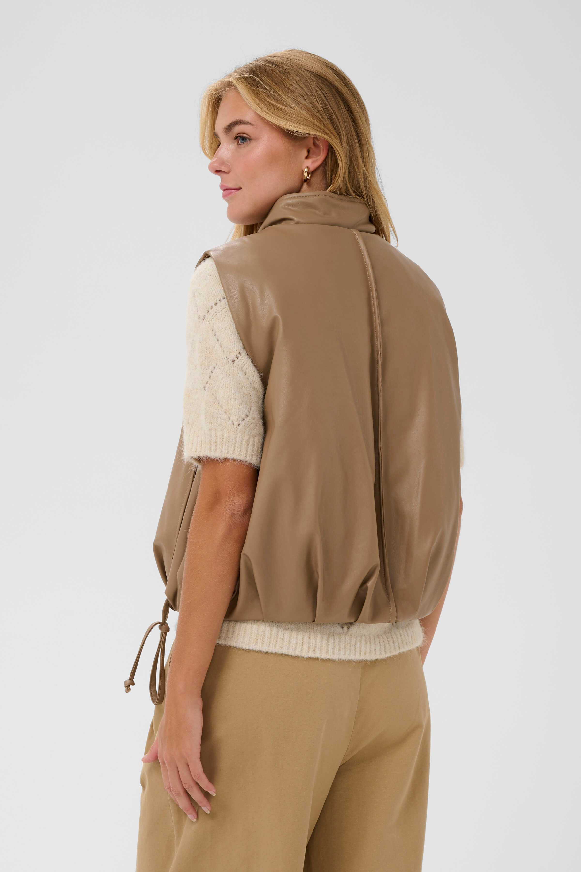 A soft brown pleather warm vest - back view