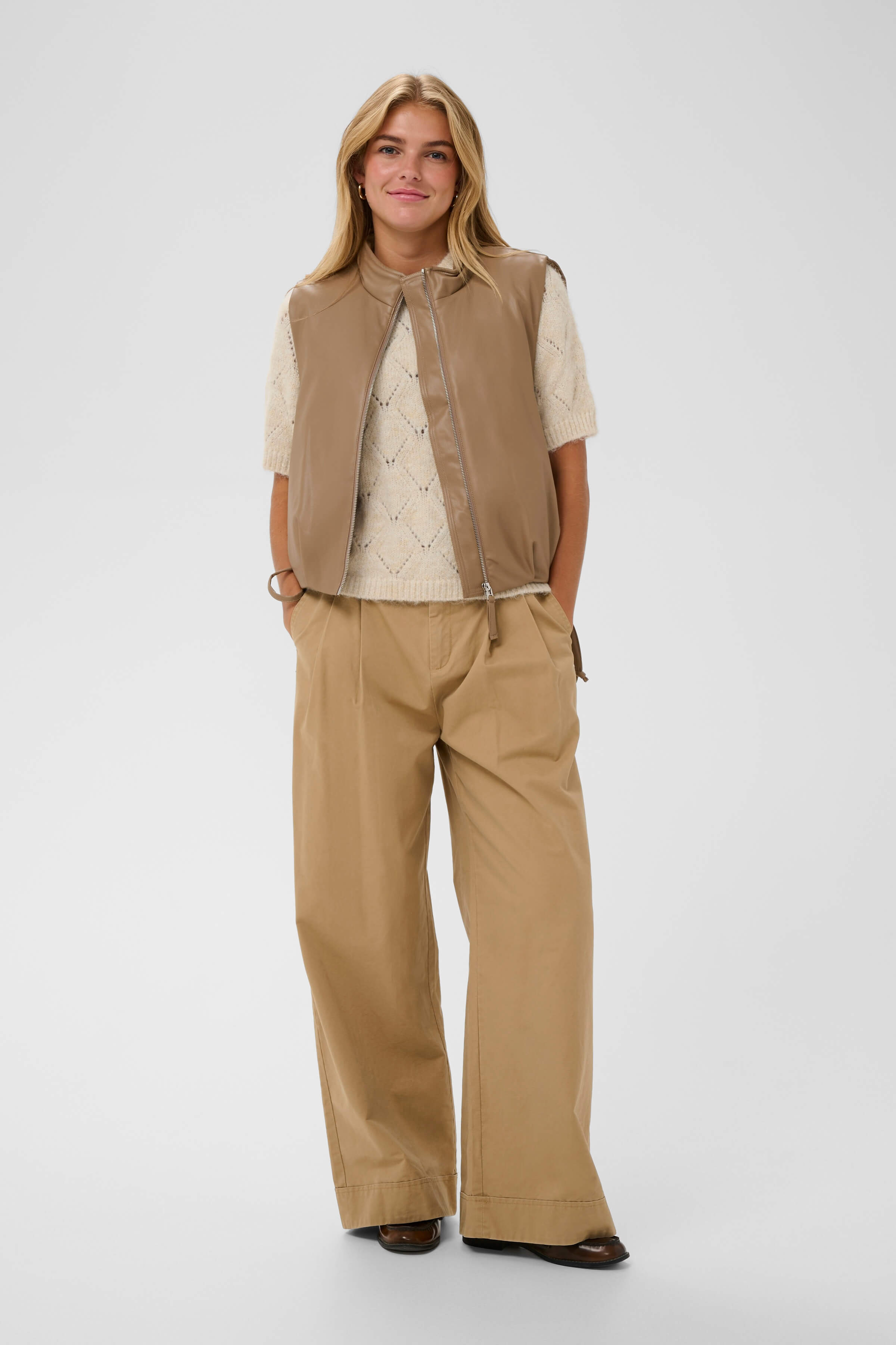 An outfit with a soft brown pleather warm vest